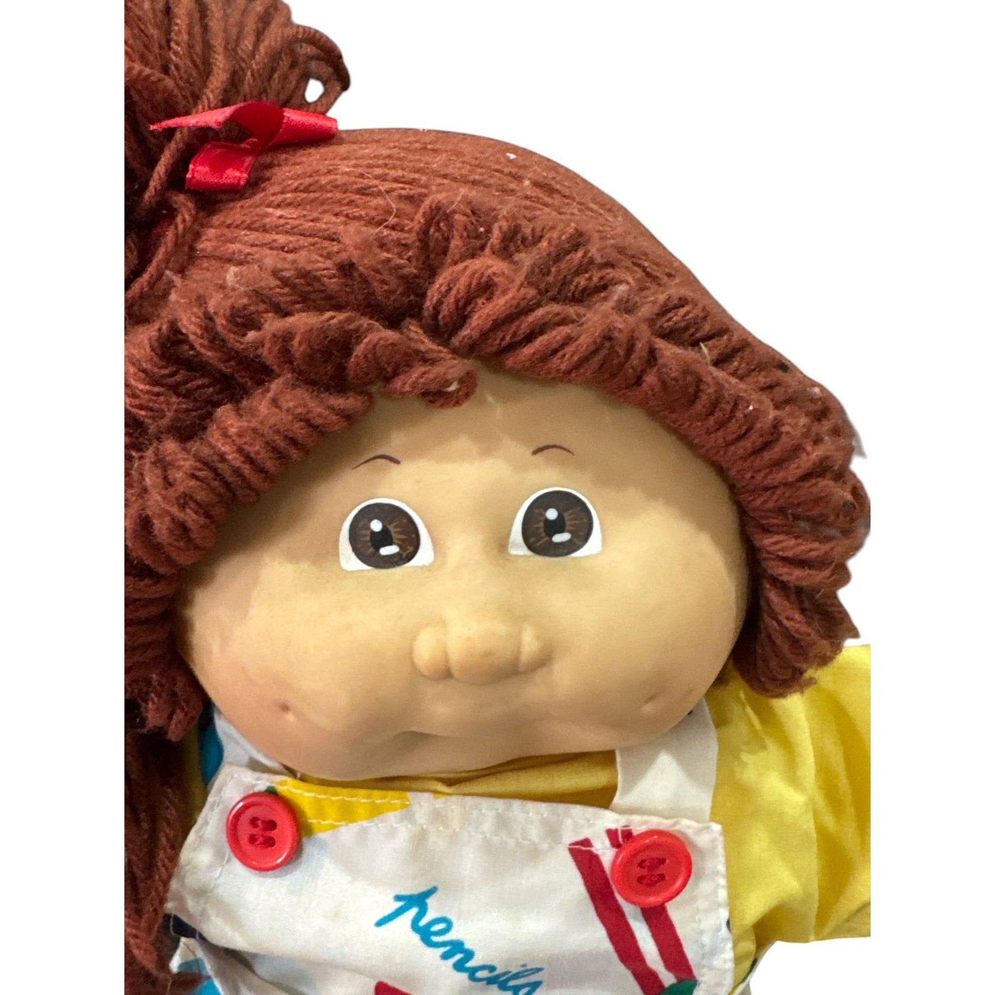 Vintage Cabbage Patch Kids Doll With Red Yarn Hair, Yellow Outfit & Printed Apron