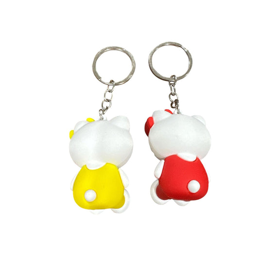 Hello Kitty Keychains Set Of 2 With Red & Yellow Outfits 3D Rubber Design 2 Inches Tall