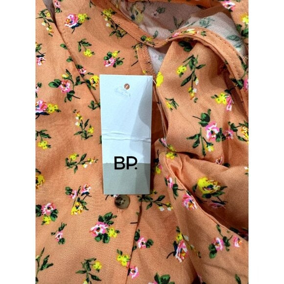 BP Sleeveless Floral Peach Mini Dress Romper With Ruffle Hem & Back Tie Size MEDIUM