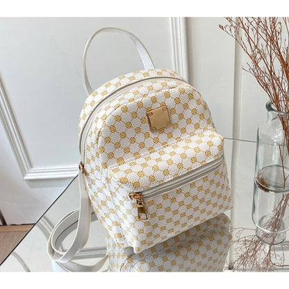 Set of 3 Mini Faux Leather Backpacks With Gold Hardware & Geometric Pattern (White, Pink, & Brown)