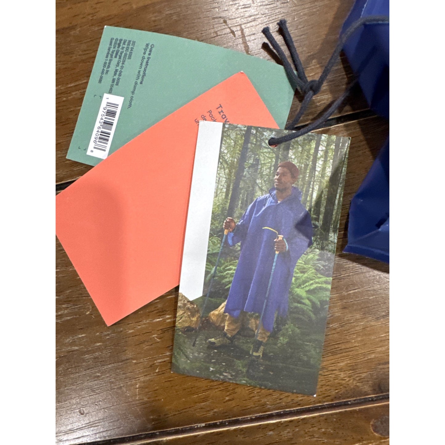 Reusable Blue Hooded Rain Poncho With Front Pocket By Embark One Size Fits Most Lightweight & Packable Design