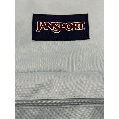 JanSport Drawstring Backpack With Front Zipper Pocket In Light Blue