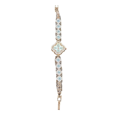 Elegant Rose Gold Crystal Watch With Clover Dial & Diamond Accents For Women
